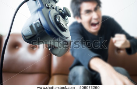 stock-photo-an-asian-young-man-throwing-video-game-controller-away-with-anger-concept-of-aggressive-serious-506972260